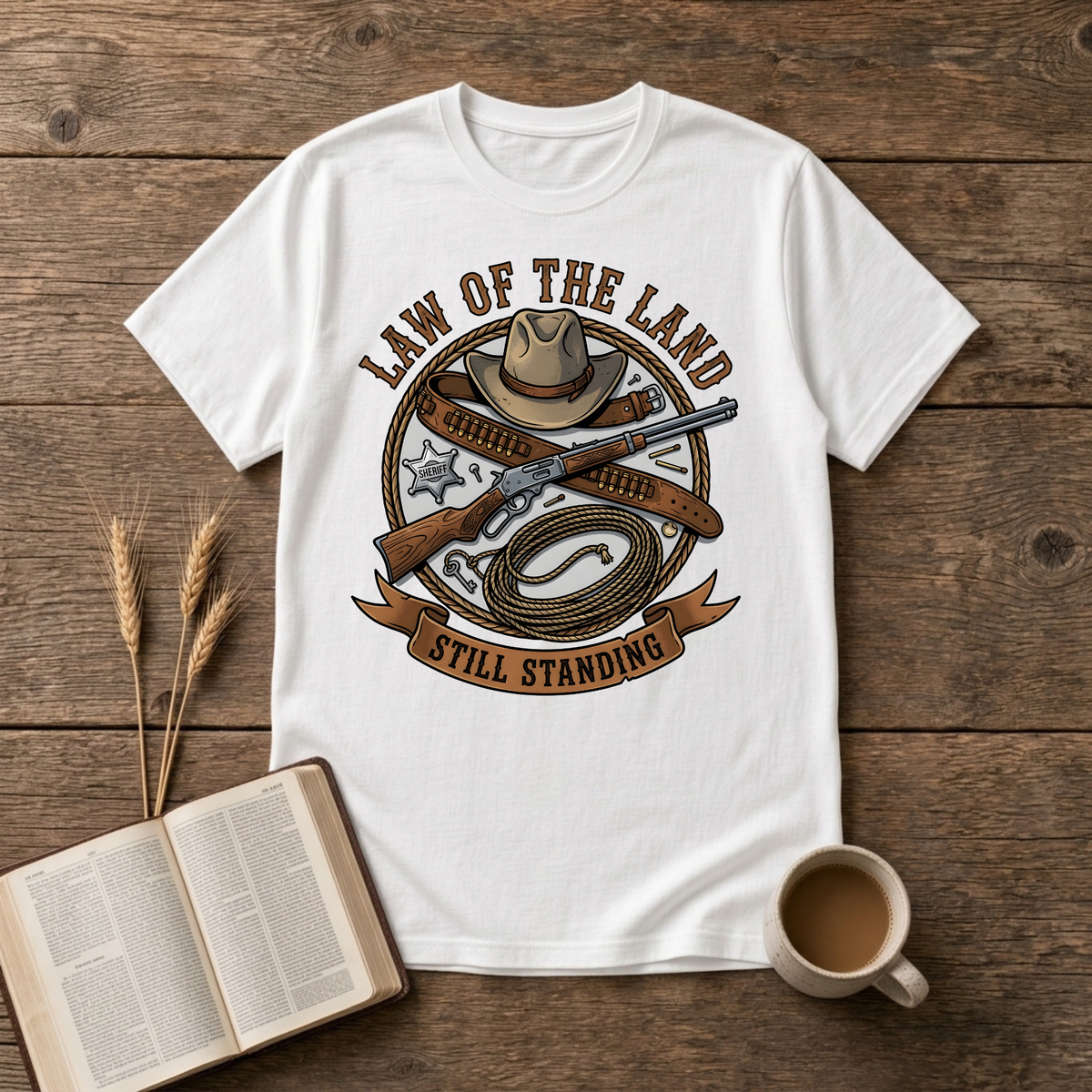 Western lawman emblem with cowboy hat, sheriff star, gun belt, lariat and rifle on a White unisex T-Shirt