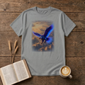 Ethereal Eagle T-Shirt in Sport Grey, front view, blue-winged eagle swooping over sunlit golden clouds graphic