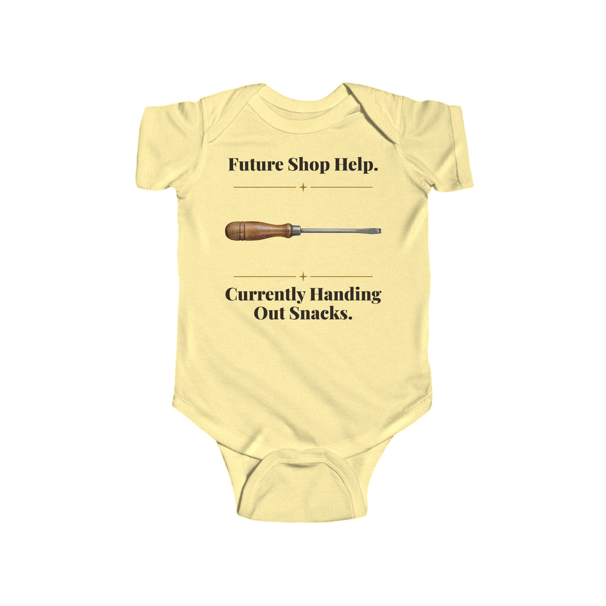 Future Shop Help baby bodysuit in Butter on a wood table with a knit blanket, wooden rattle and open Bible