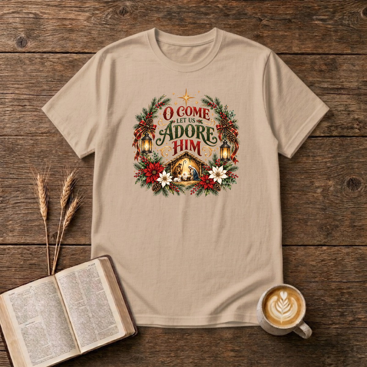 O Come Let Us Adore Him nativity wreath design with a glowing stable, poinsettias and holly on a Natural unisex T-Shirt
