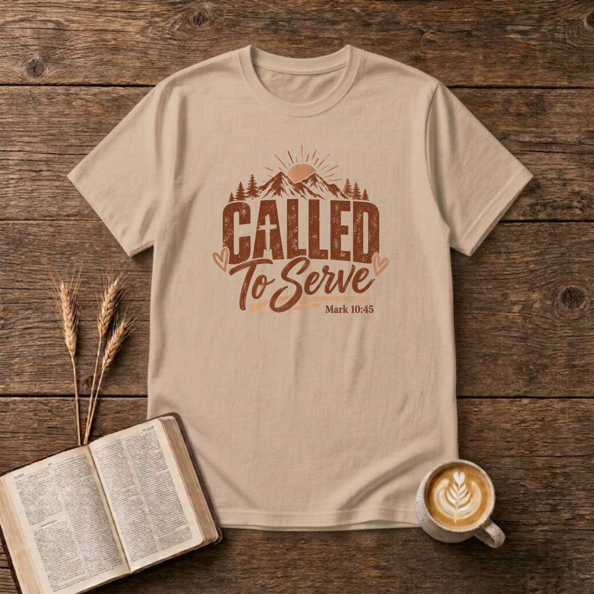 Called to Serve Mark 10:45 design with distressed lettering, a cross in the A and a mountain, pine and sunrise scene on a Natural unisex T-Shirt
