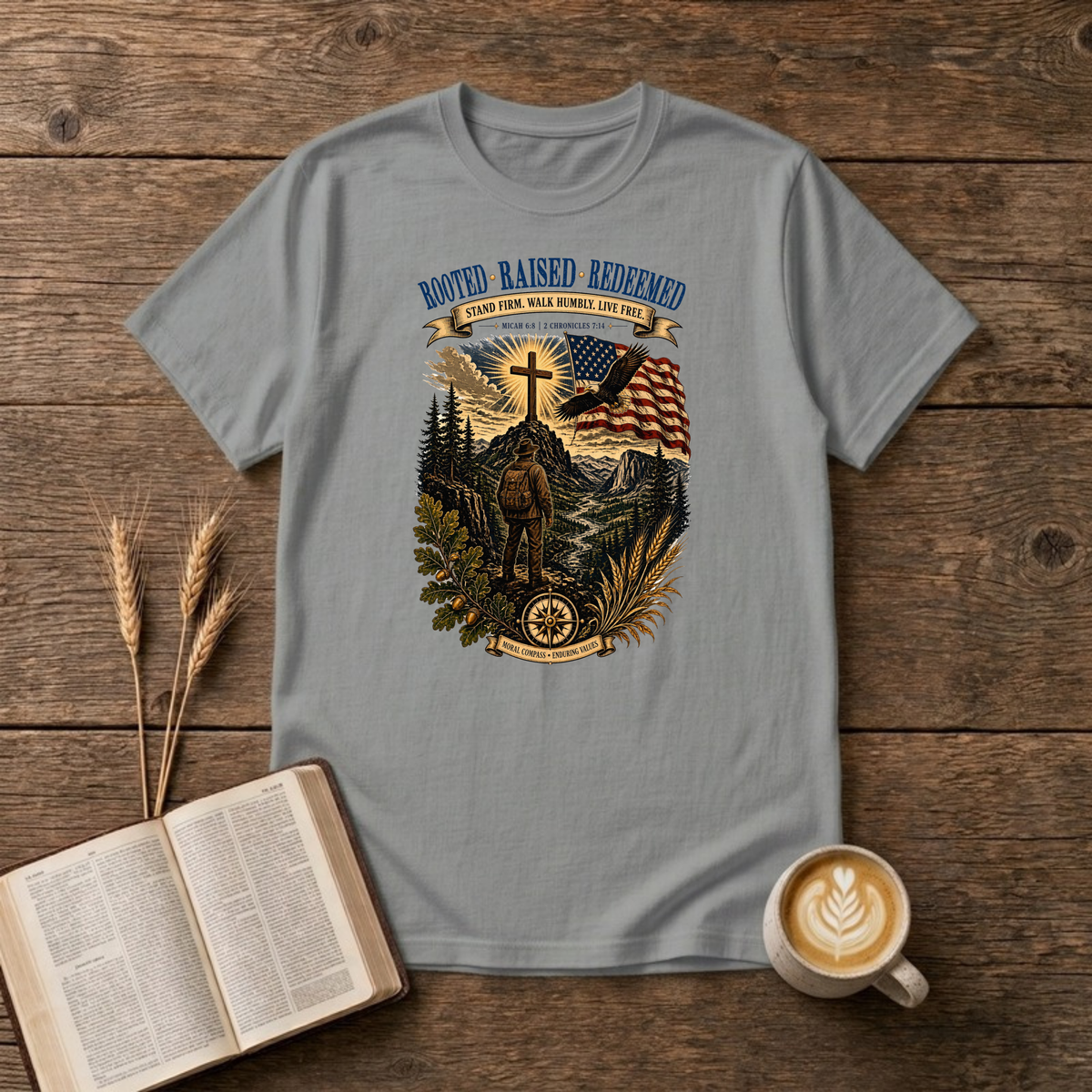 Rooted. Raised. Redeemed. mountain scene with a hiker, cross, waving flag and eagle on a Sport Grey unisex T-Shirt