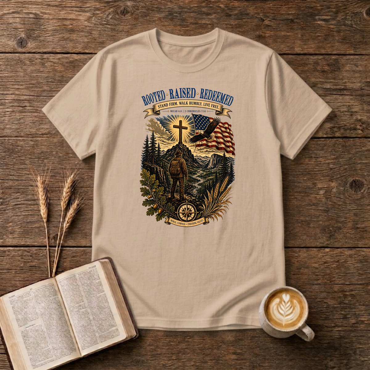 Rooted. Raised. Redeemed. mountain scene with a hiker, cross, waving flag and eagle on a Natural unisex T-Shirt