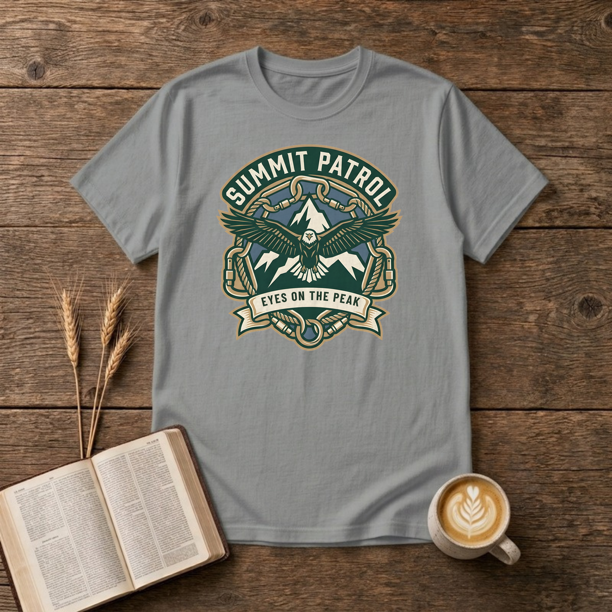 Summit Patrol design with an eagle, snow peaks and a ribbon reading Eyes On The Peak on a Sport Grey unisex T-Shirt.