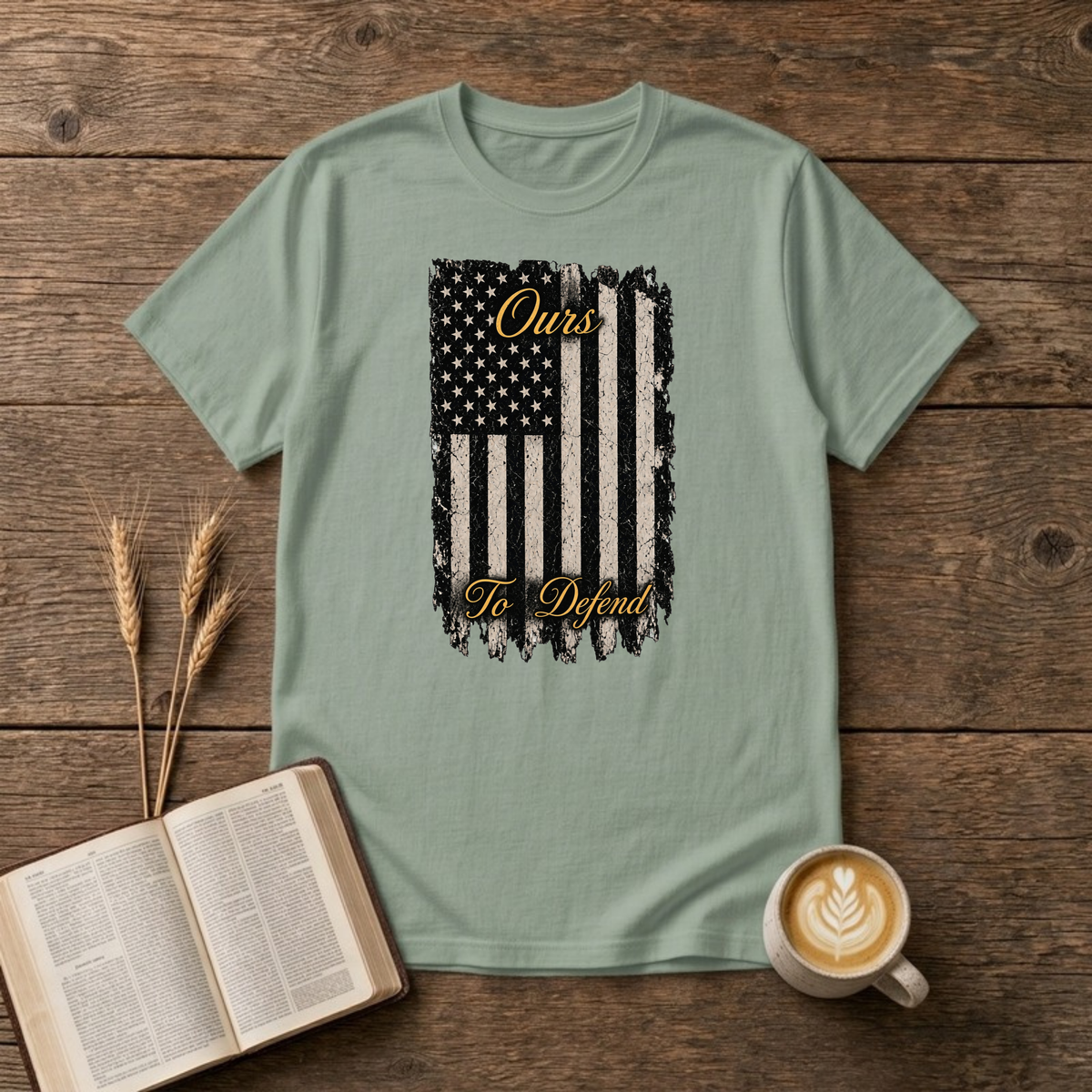 Ours To Defend distressed American flag design on a Sage unisex T-Shirt