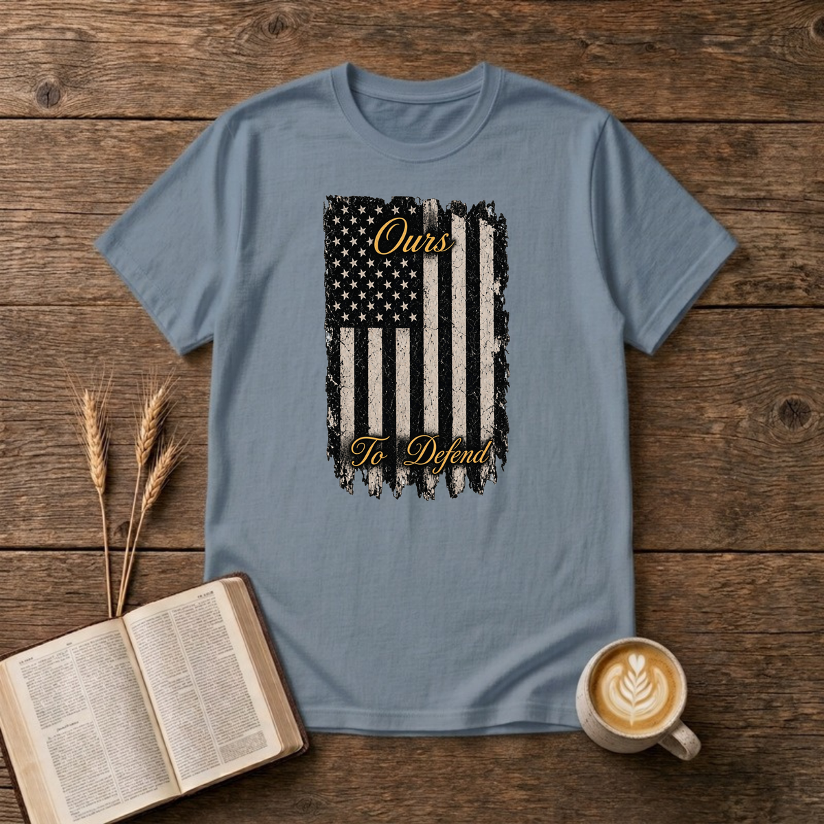 Ours To Defend distressed American flag design on a Stone Blue unisex T-Shirt