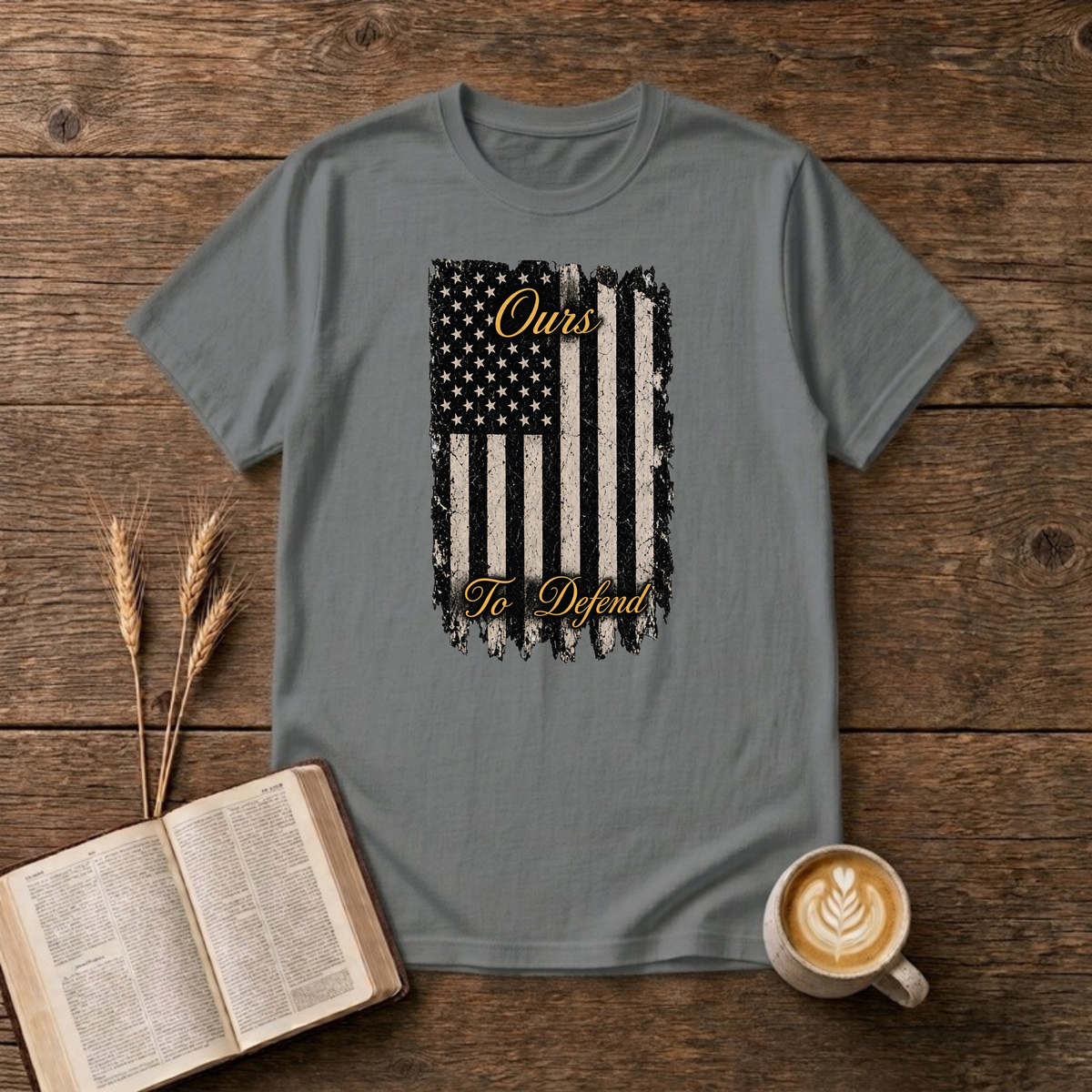 Ours To Defend distressed American flag design on a Graphite Heather unisex T-Shirt