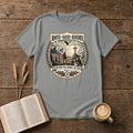 Rooted. Raised. Redeemed. crest badge with a hiker, cross, American flag, eagle and laurel frame on a Sport Grey unisex T-shirt