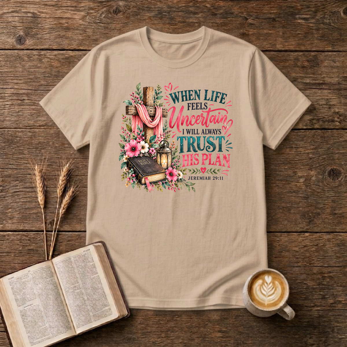 When Life Feels Uncertain T-Shirt in Natural, Jeremiah 29:11 wooden cross with pink flowers and Bible faith graphic